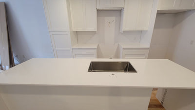 Quartz countertop with undermount stainless steel Grifon sink